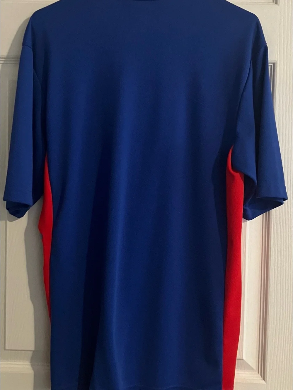 Youth New York Giant’s Royal Blue Polo with Red Side Panels Size M